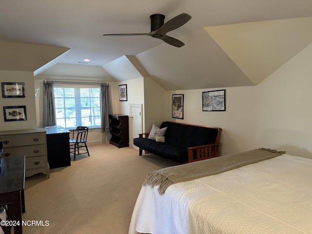 bedroom featuring ceiling fan, lofted ceiling, and light colored carpet