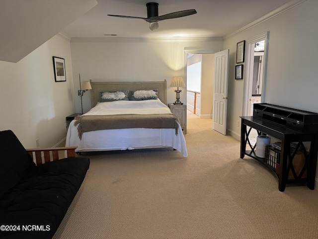 bedroom featuring ceiling fan, crown molding, and light carpet