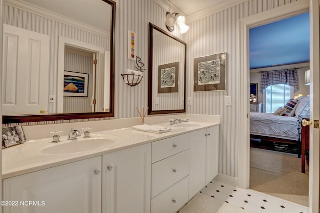 bathroom with tile flooring, crown molding, oversized vanity, and double sink