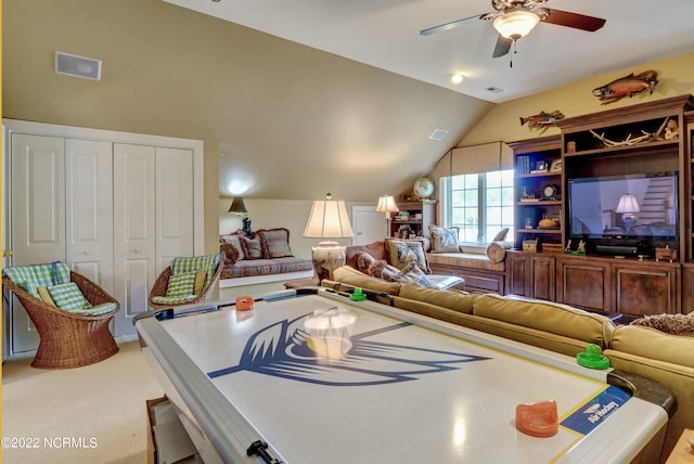 game room with carpet, ceiling fan, and lofted ceiling