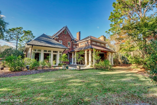 exterior space featuring a front lawn