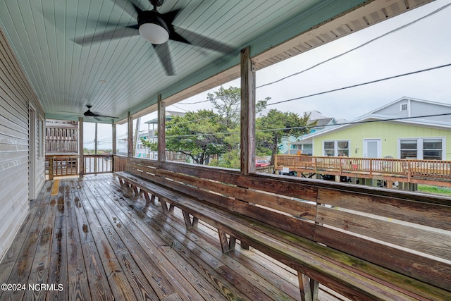 exterior space featuring outdoor lounge area, a balcony, and ceiling fan