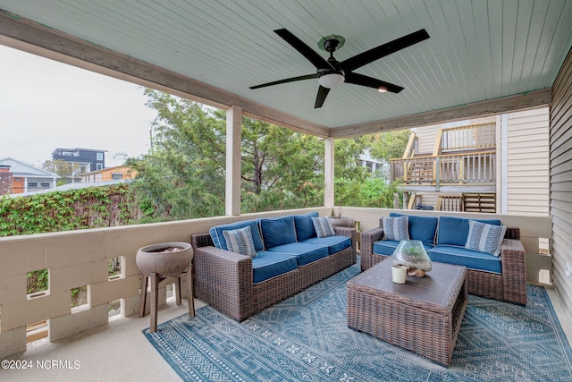 view of terrace featuring outdoor lounge area, a balcony, and ceiling fan