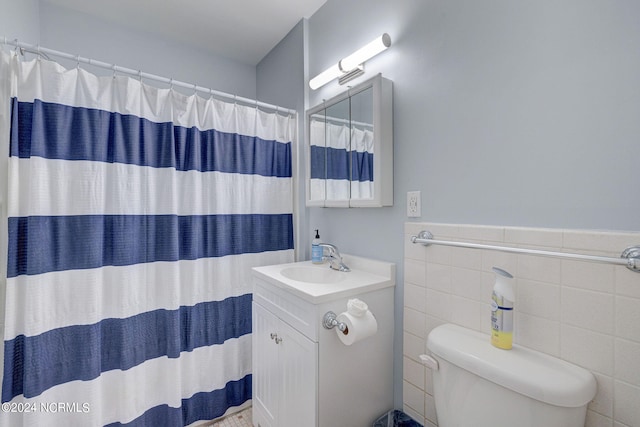 bedroom with tile flooring, ceiling fan, and multiple windows