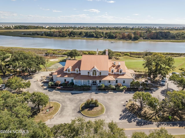 bird's eye view with a water view