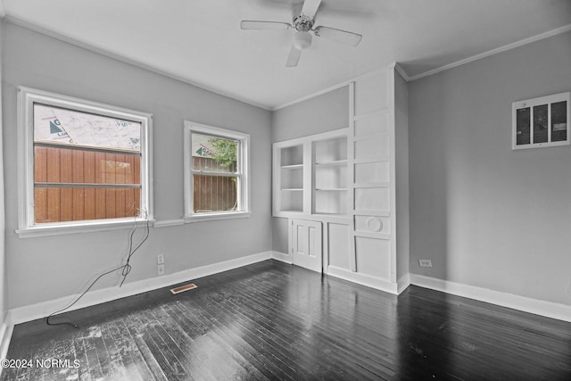 unfurnished room featuring ceiling fan and dark wood-type flooring