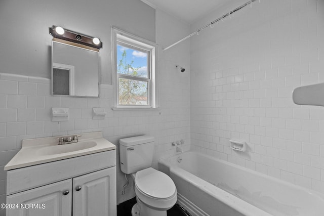 full bathroom featuring tile walls, tiled shower / bath combo, and oversized vanity