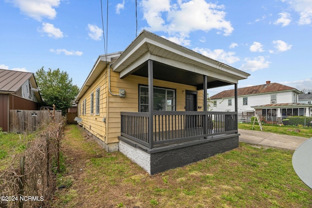 exterior space featuring a lawn