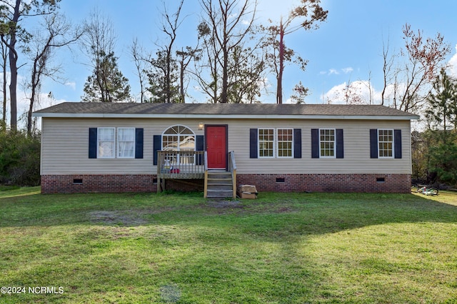 view of front of home with a front yard