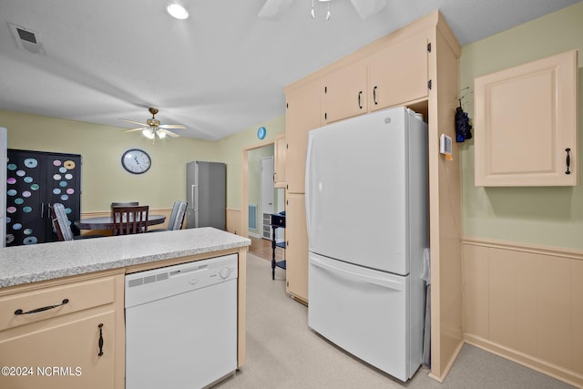 kitchen featuring ceiling fan and white appliances