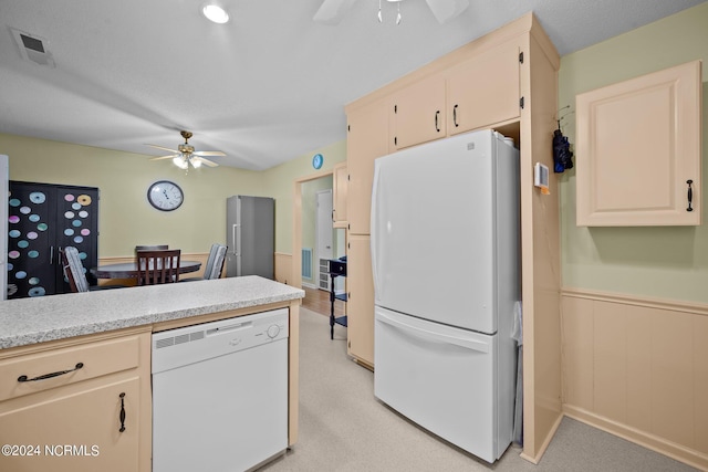 kitchen featuring ceiling fan and white appliances