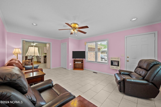 living room with crown molding, a textured ceiling, heating unit, and ceiling fan