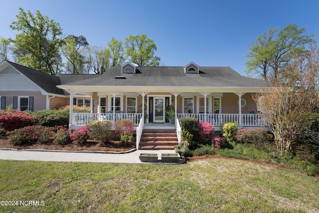 view of front of home featuring a porch and a front lawn