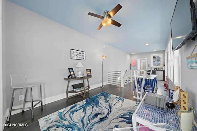 bedroom with ceiling fan and dark wood-type flooring