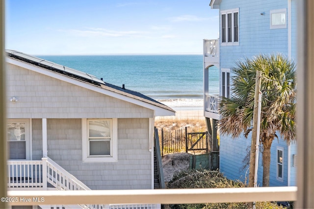 property view of water featuring a beach view