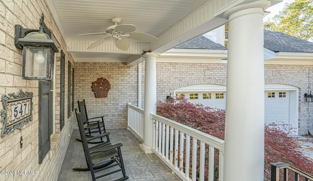 balcony featuring a porch and ceiling fan