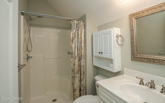 bathroom with a shower with curtain, vanity, lofted ceiling, and toilet