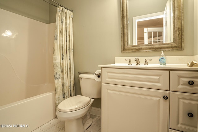 full bathroom with vanity, tile patterned flooring, toilet, and shower / tub combo with curtain