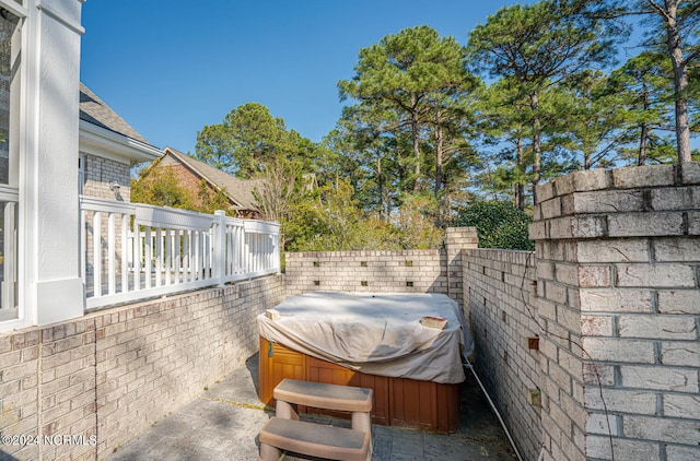 exterior space featuring a hot tub