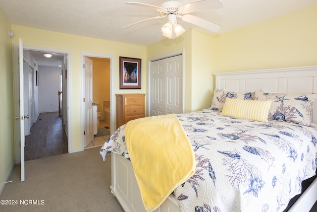 carpeted bedroom featuring a closet and ceiling fan