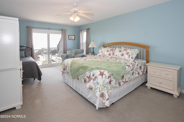 bedroom with ceiling fan and access to outside