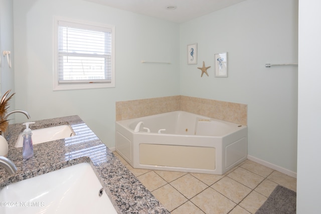 bathroom with tile flooring, vanity, and a bath