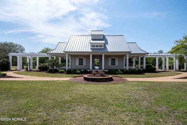 exterior space featuring a porch, a pergola, and a lawn