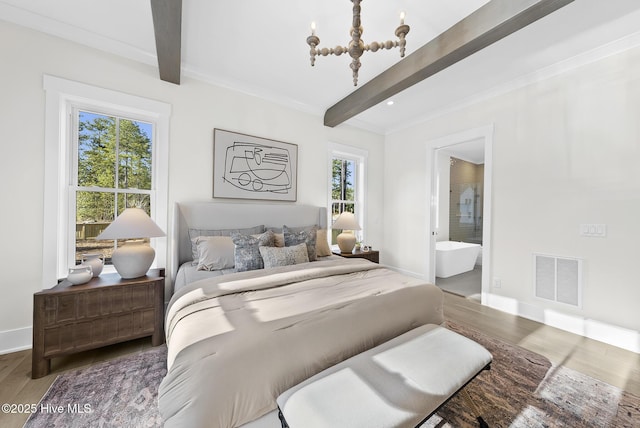 bedroom featuring visible vents, baseboards, beamed ceiling, wood finished floors, and a notable chandelier