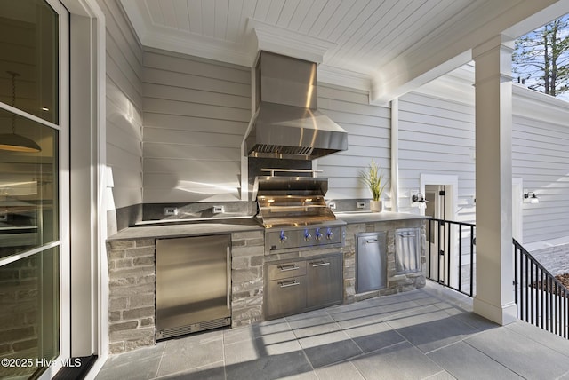 view of patio / terrace with a grill and exterior kitchen