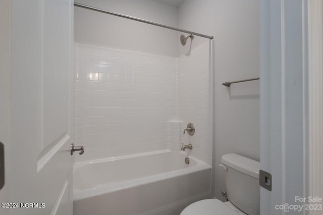 full bathroom with shower / bath combination and toilet