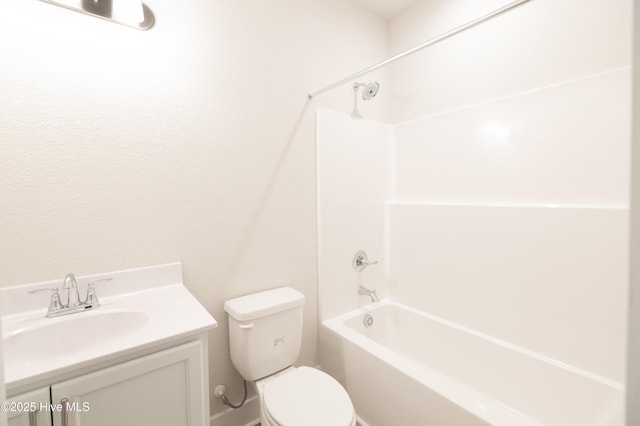 full bathroom with washtub / shower combination, toilet, and vanity