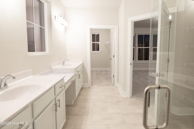 bathroom with vanity and walk in shower