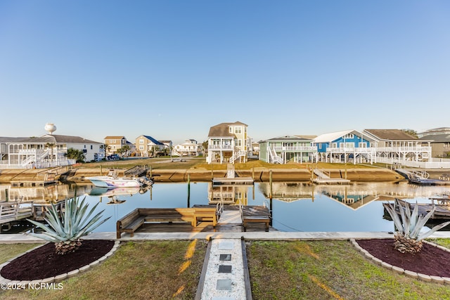 dock area featuring a water view