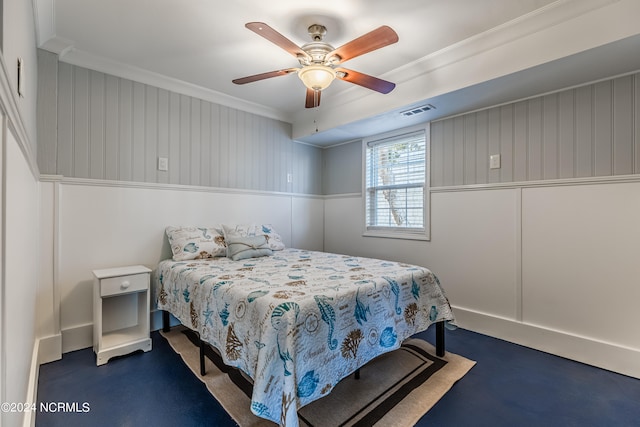 bedroom with ornamental molding and ceiling fan