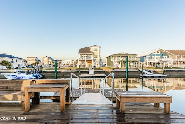 dock area with a water view