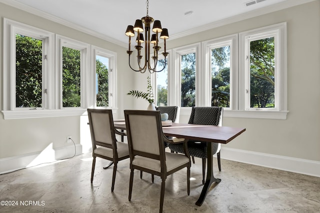 dining space featuring crown molding and plenty of natural light