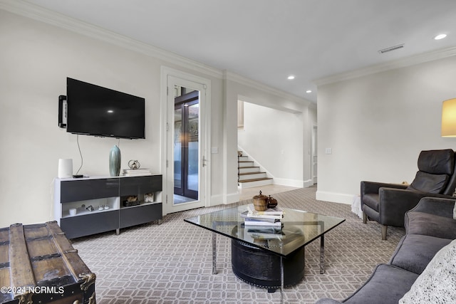 carpeted living room featuring ornamental molding