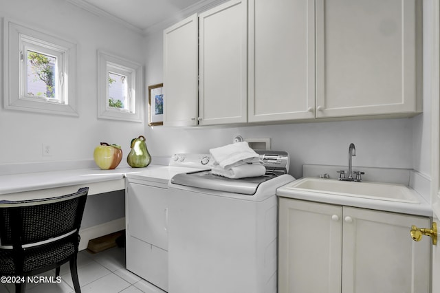 laundry room with sink, cabinets, separate washer and dryer, light tile patterned floors, and ornamental molding