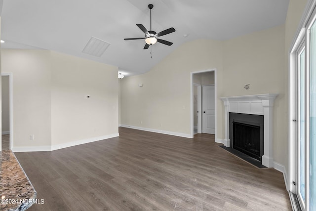 unfurnished living room with ceiling fan, hardwood / wood-style flooring, and vaulted ceiling