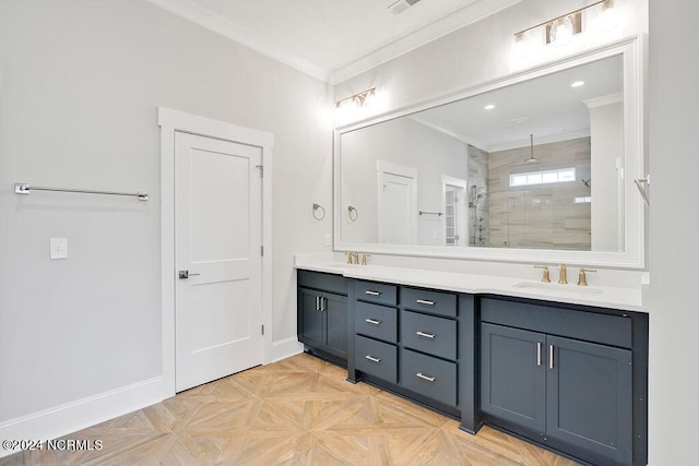 bathroom featuring parquet flooring, a tile shower, double vanity, and crown molding