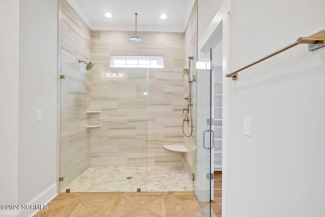 bathroom with parquet flooring and a shower with shower door