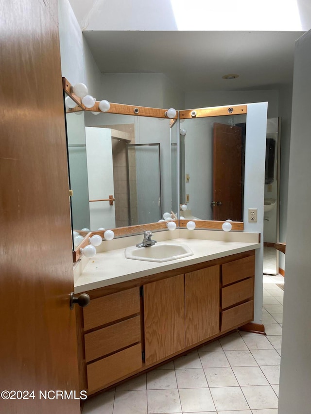 bathroom featuring vanity and tile patterned floors