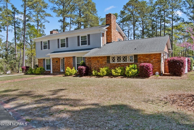 view of front facade with a front yard