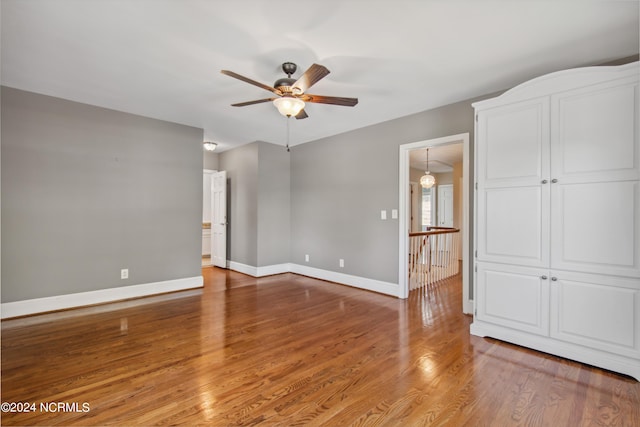 spare room with ceiling fan and light hardwood / wood-style floors