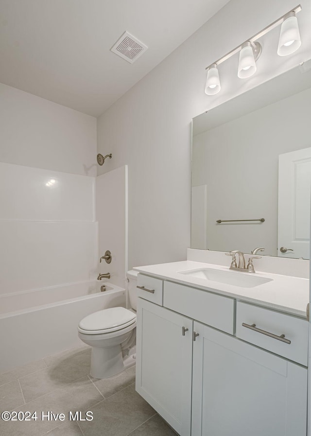 full bathroom with tile patterned floors, vanity,  shower combination, and toilet