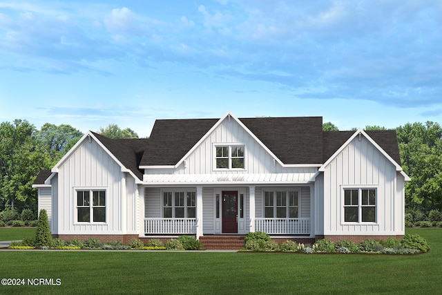 modern farmhouse with covered porch and a front lawn