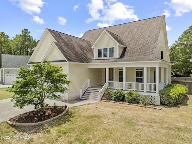 view of front of property with covered porch and a front yard