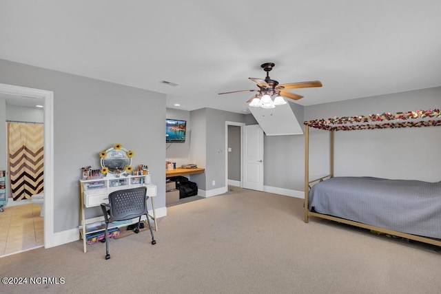 carpeted bedroom featuring ceiling fan