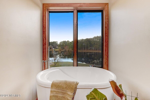 bathroom featuring a water view