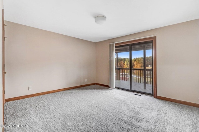 view of carpeted spare room